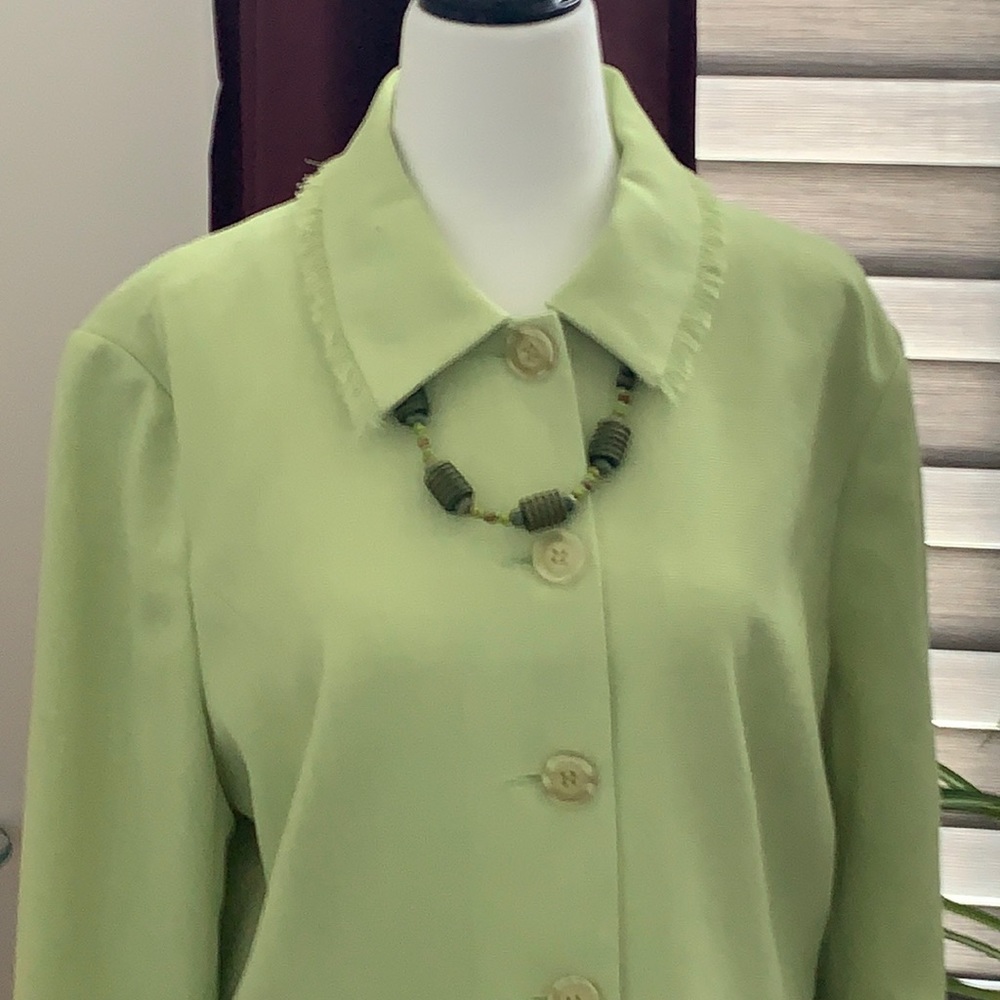 Women’s two piece pant suit with necklace